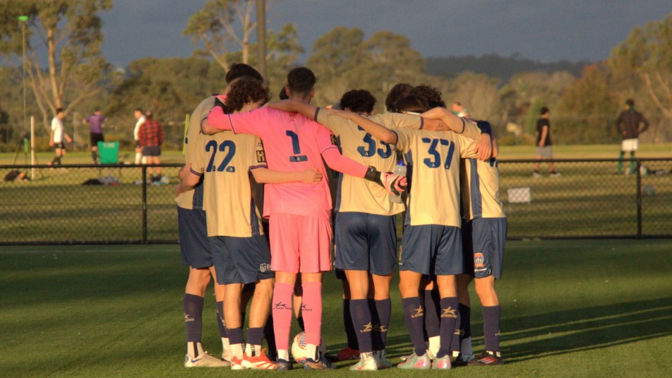Youth team huddle vs Northern Tigers away, 2025
